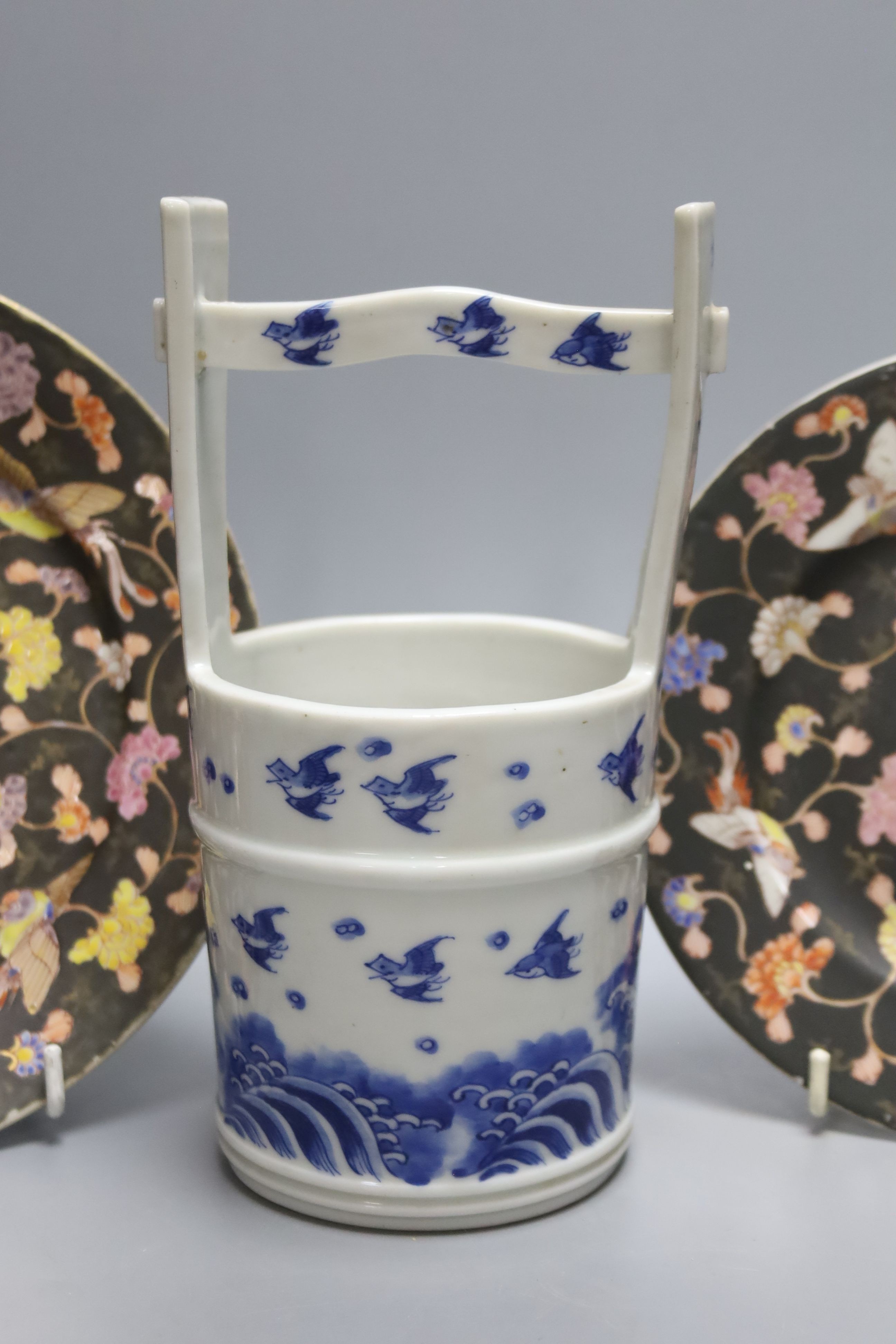 Two Fukagawa Koransha plates, a Kanzan Denshichi rectangular water dropper, a Japanese blue and white bucket and a dish, tallest 20cm